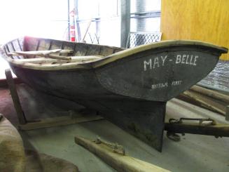 Transom view of MAY-BELLE in storage