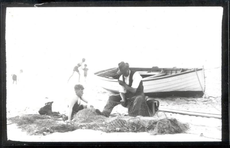 The Klauers on the beach at Seaford with the flattie in the background, date unknown
