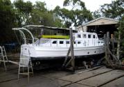 BAYBIRD being slipped, and  the chine  hull shape is visible