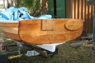 transom view of THE MAYFLY showing the slight tumblehome of a Fazackerley dinghy