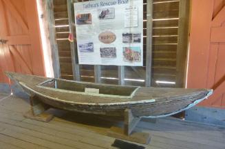The Tathra canvas boat on display in 2020 at the museum