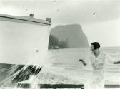 Launching ALBATROSS in 1936, Beth Kirby smashes a champagne bottle across the vessel's bow.