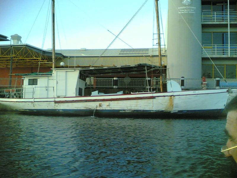 ANTONIA  in Townsville 2005, about to begin restoration by removing added deck superstructure.