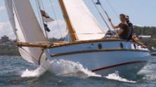 RANGER beating upwind and showing off its firm bilged, raised deck hull shape