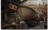 A view from the bow showing PORT FAIRY under restoration in 1996, with the original diagonal pl…