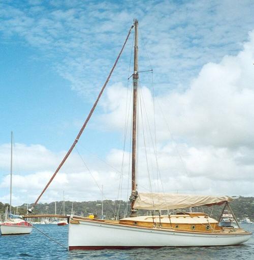 JUNE BIRD in 2005 at its moorings, the couta boat stem and  sheerline stand out in this image.