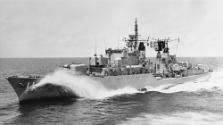 HMAS VAMPIRE up to full speed in calm conditions, creating an impressive bow wave as it carves …
