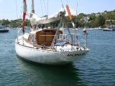 This stern view of RONITA shows the  transom and cabin arrangment with a doghouse to provide sh…