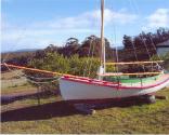 Stern view of CORIANNE in 2007 with outboard bracket and swing rudder.