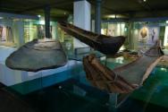 On the right of this view in the foreground is one end of the bark canoe with the lashed togeth…