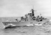 A classic view of HMAS VOYAGER at sea, around 1960.