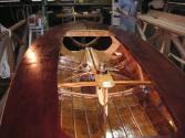 TAIPAN shows off the varnish work on restored hull at Sydney Harbour Wooden Boats in nid 2007.