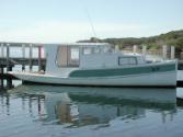 Before restoration in 2004, JEANARA had acquired a raised deck and a cabin over many years of d…