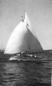 MALUKA under spinnaker racing with SASC on Sydney Harbour during the 1930s.
