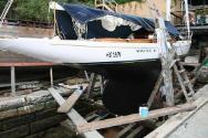MISTRAL IV slipped and showing its classic long keel underbody