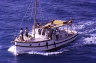 WAIBEN off Thursday Island in 1963, with Harbour Master Bob Sharp on the side deck.