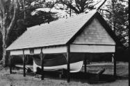 The lifeboat on display in the 1900s under a covered shelter at Portland