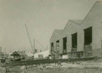 A view looking east across the waterfront at Green Point Naval Boatyard during World War II