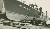 A US Army Fast Supply Vessel , based on the Fairmile hull. This vessel is on one the slipways b…
