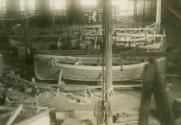 Lifeboats under construction in the shed after World War II.