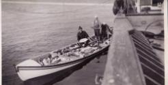 the surf boat filled with a good catch in the 1950s