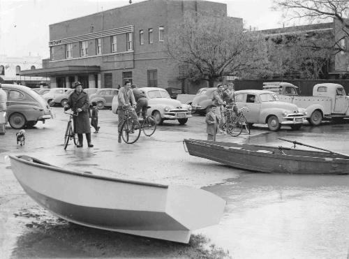 1956, a flooded Murrimbidgee River, and CONRAE II is pulled up near the hotel at Forsyth St Wag…