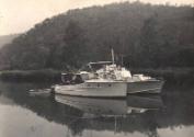 BROADBILL rafted up with an unidnetified cruiser, in a bay on the NSW coast, date unknown.