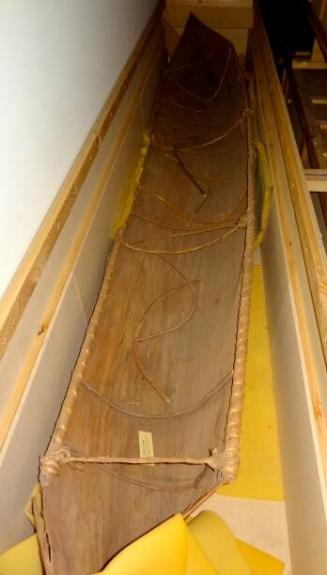 The Northern Territory Sewn Bark Indigenous Canoe in storage 